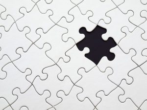 missing teeth represented by puzzle