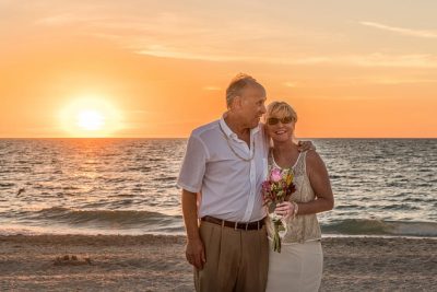 smiling couple dental implants
